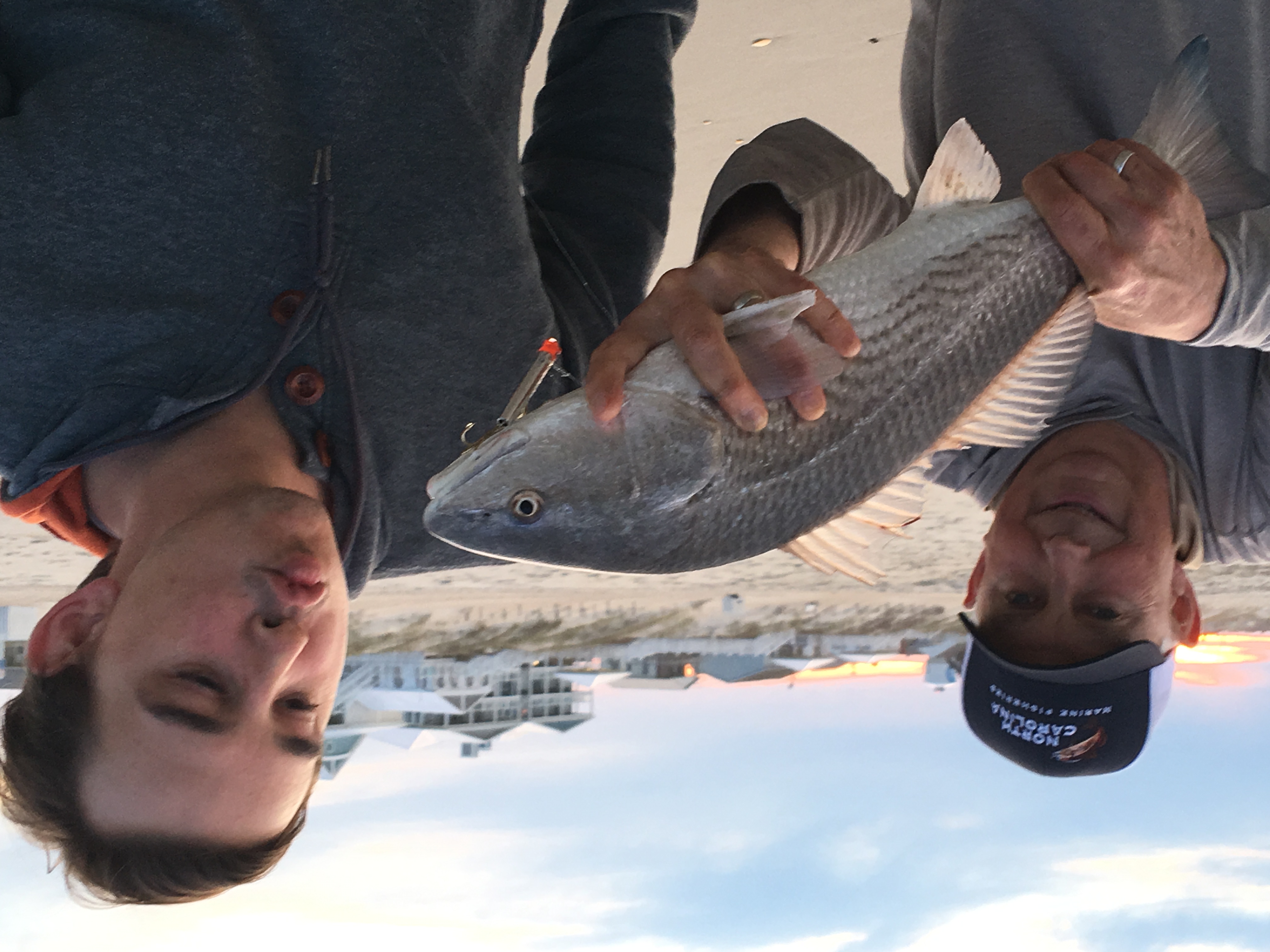 Attempting to kiss a fish.